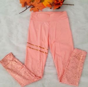 Leggings with gold stripes and splash design